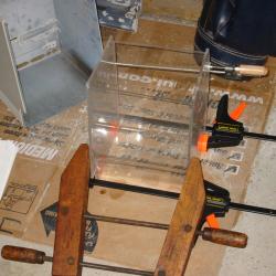 More adhering the plexiglas