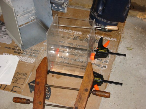 More adhering the plexiglas